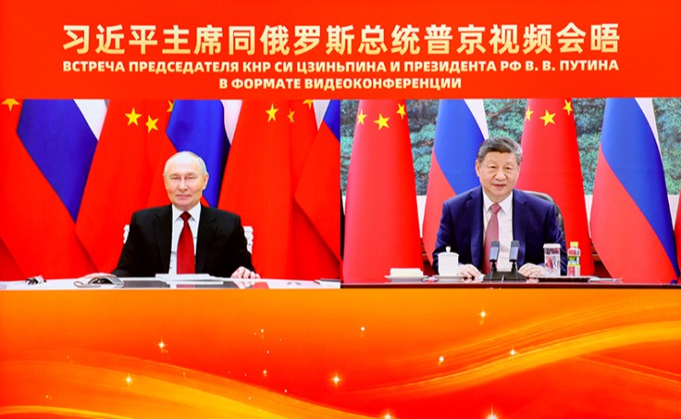 习近平同普京举行视频会晤