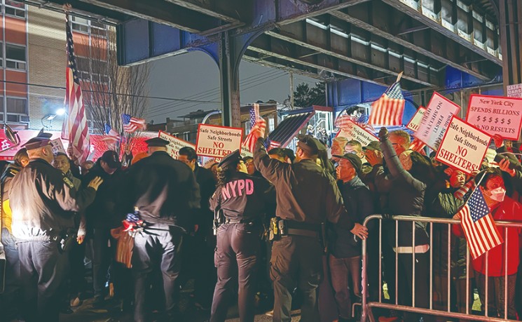 布碌仑86街游民所突动工 民众奋力阻拦