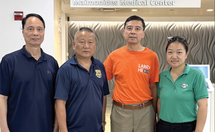 贺立宁谢晓琼携手社区助离世侨胞入土为安